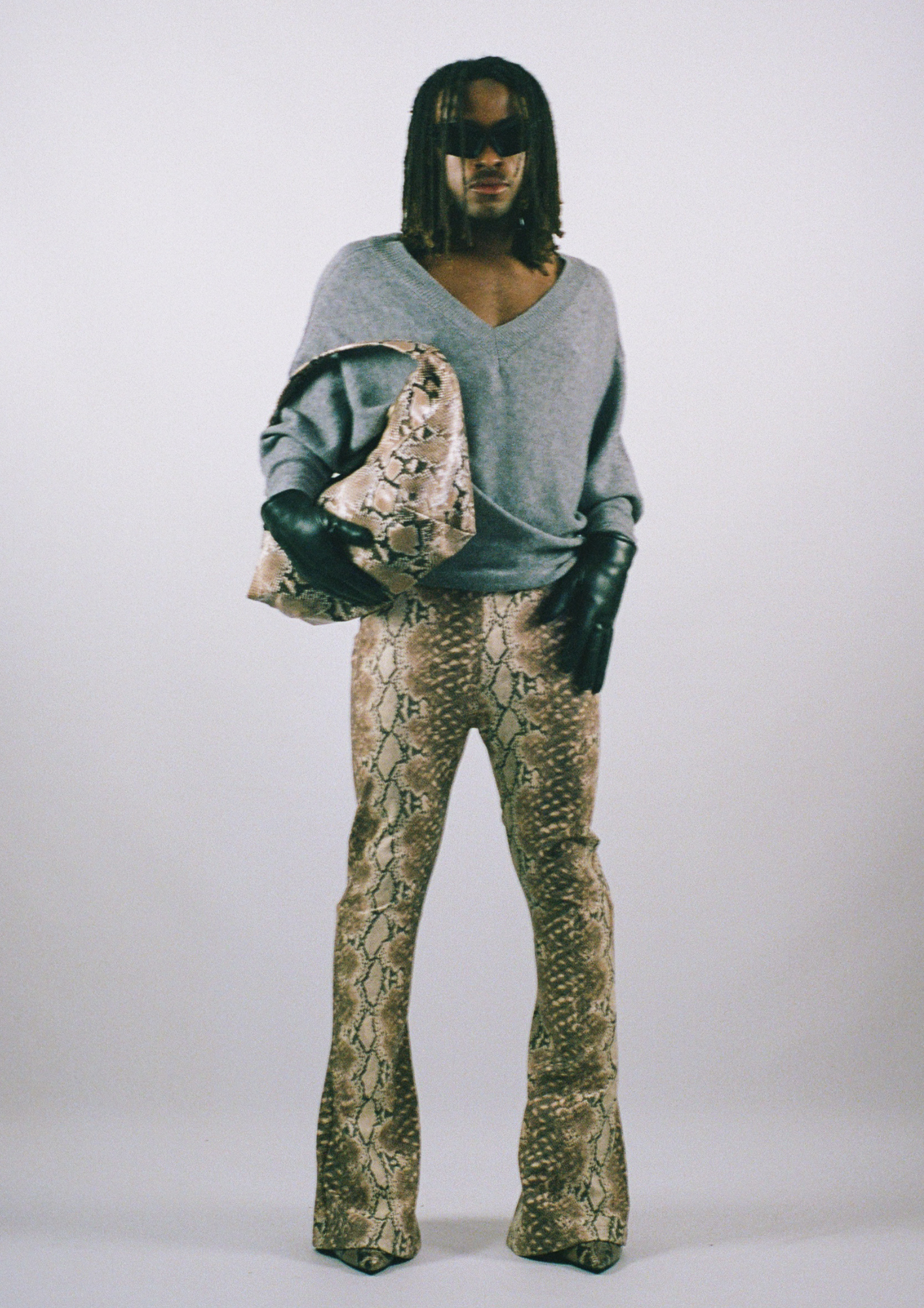 Faux leather flared pants snake print